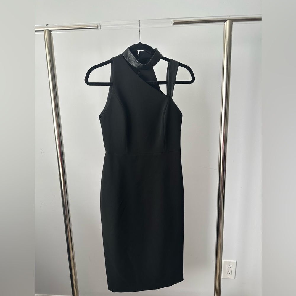 LBD with Leather Trim will make him obey.